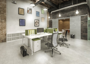 workstations in benching typicals with screens and ergonomic chairs