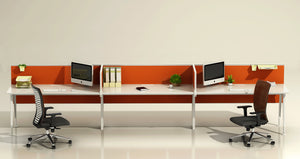 workstations in benching typicals with screens and ergonomic chairs